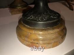 MOREAU L&F. Paire de grands vases en régule, décor en ronde-bosse de chérubins